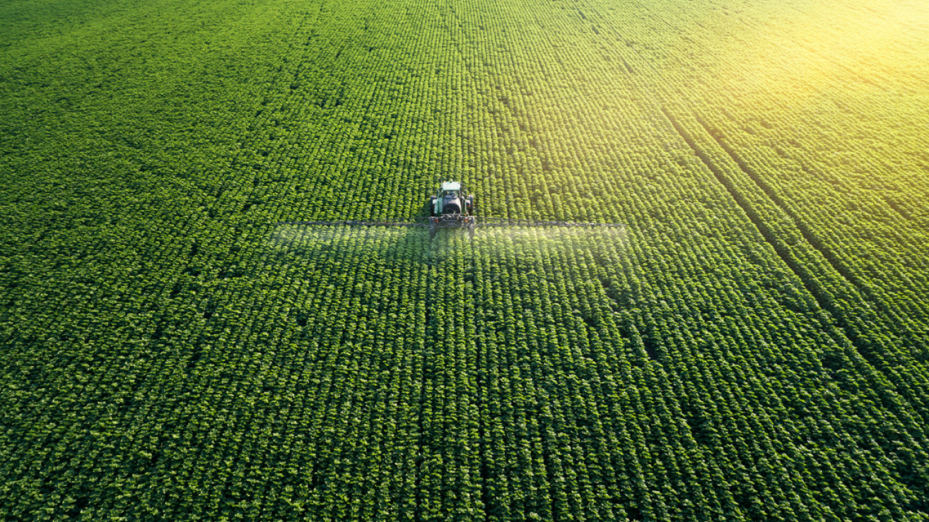 Green open country with tractor