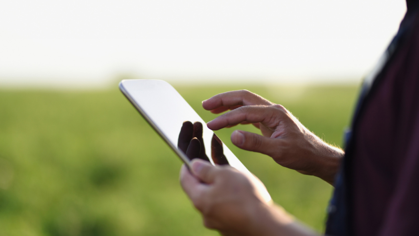 Man navigating on tablet